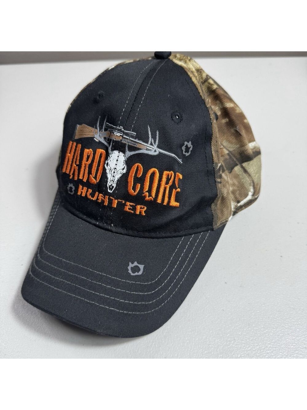 Hard Core Hunter Realtree Outdoor Camo and Black Hat / Cap with Skull & Gun Logo